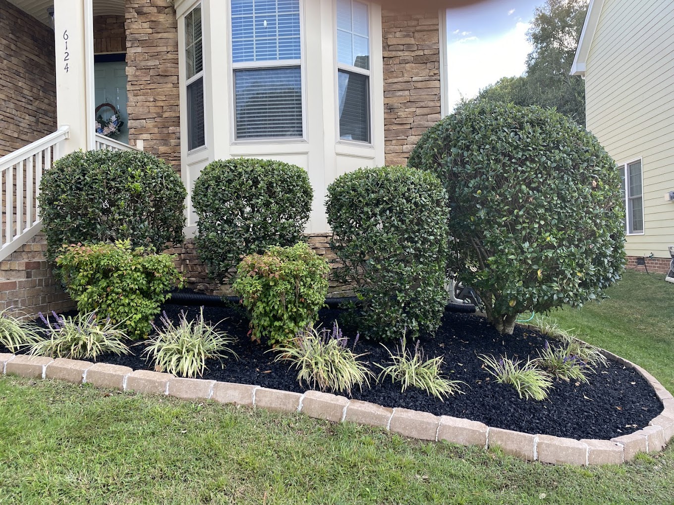 Gutter cleaning service in progress by Morring and Son's Landscaping
